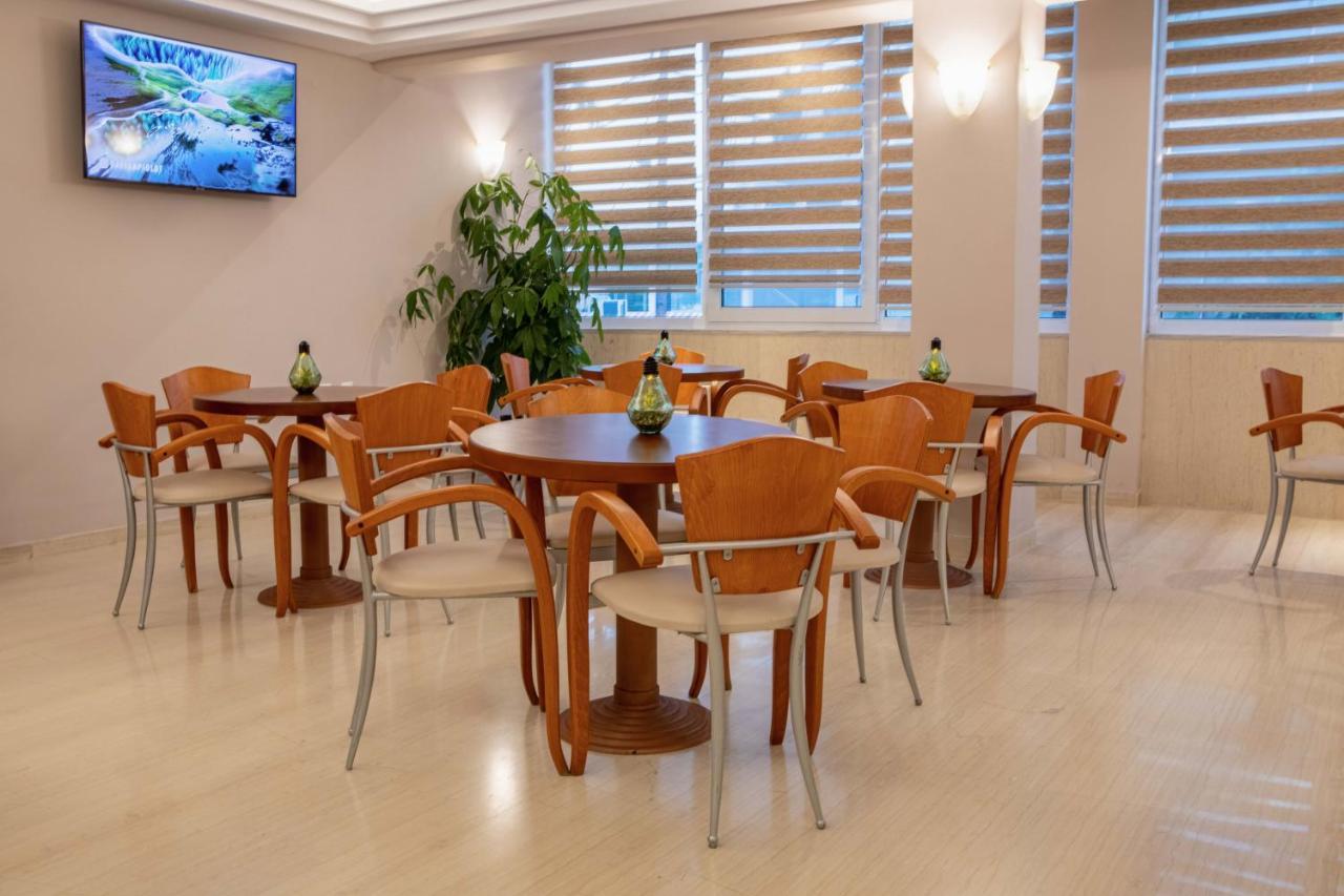 Hotel Serenity Toló Kültér fotó