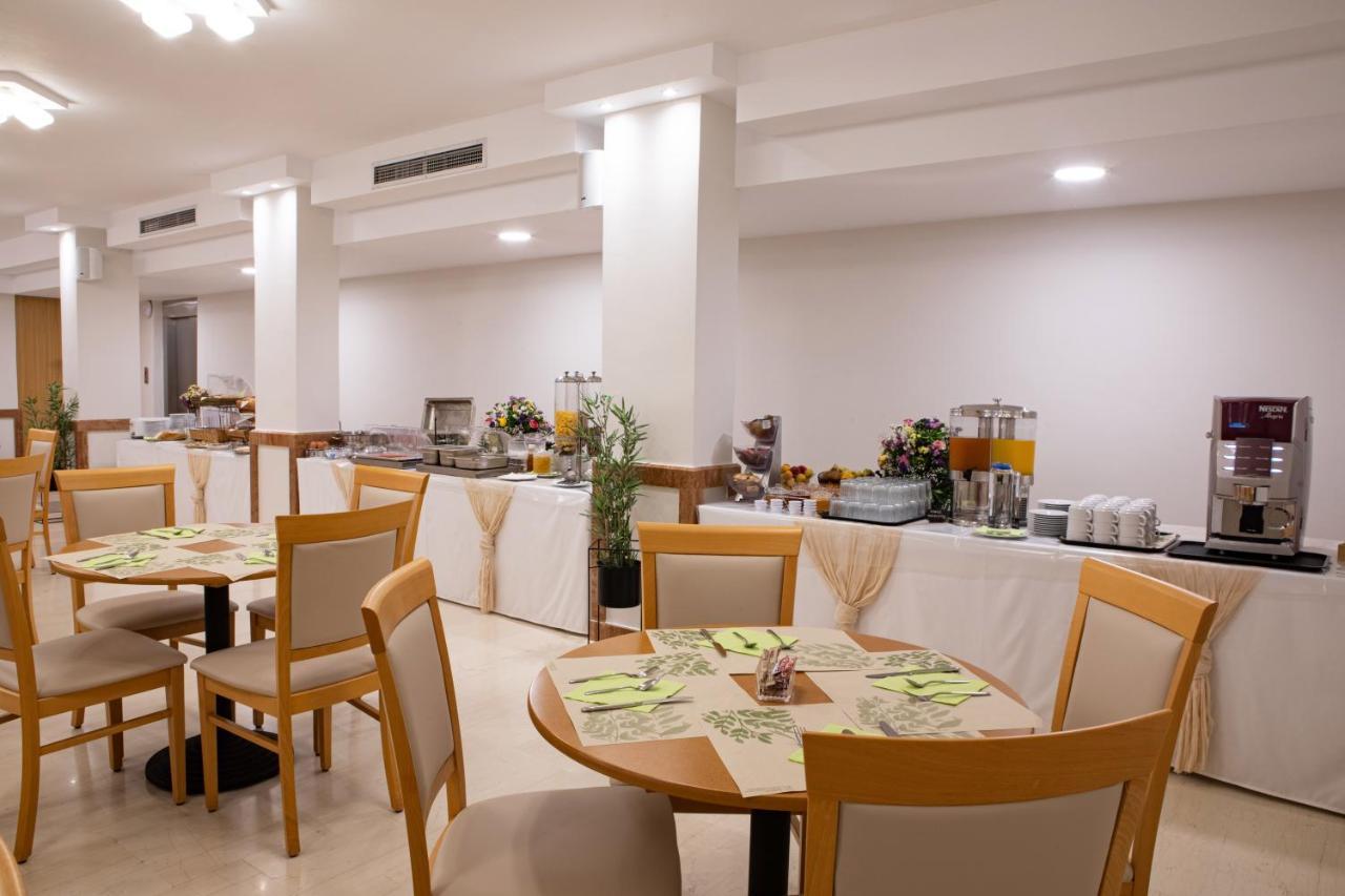 Hotel Serenity Toló Kültér fotó