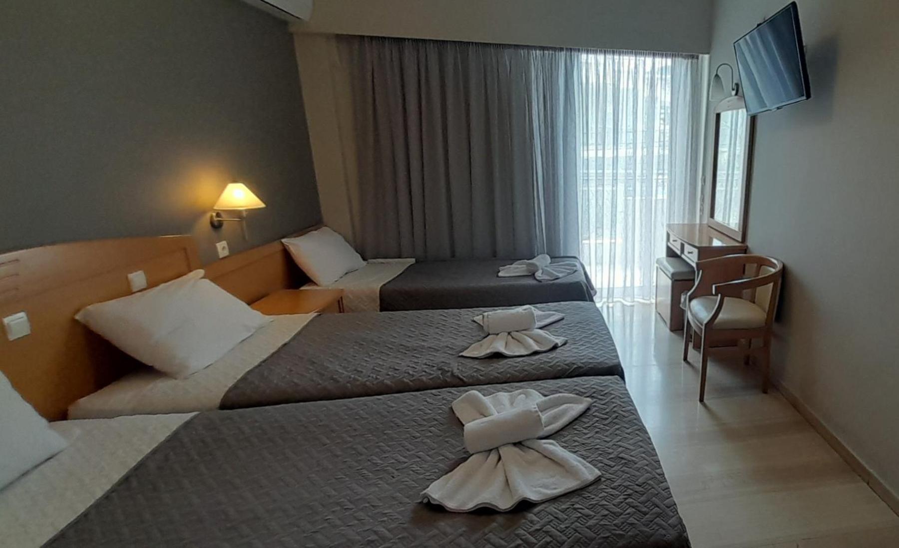 Hotel Serenity Toló Kültér fotó