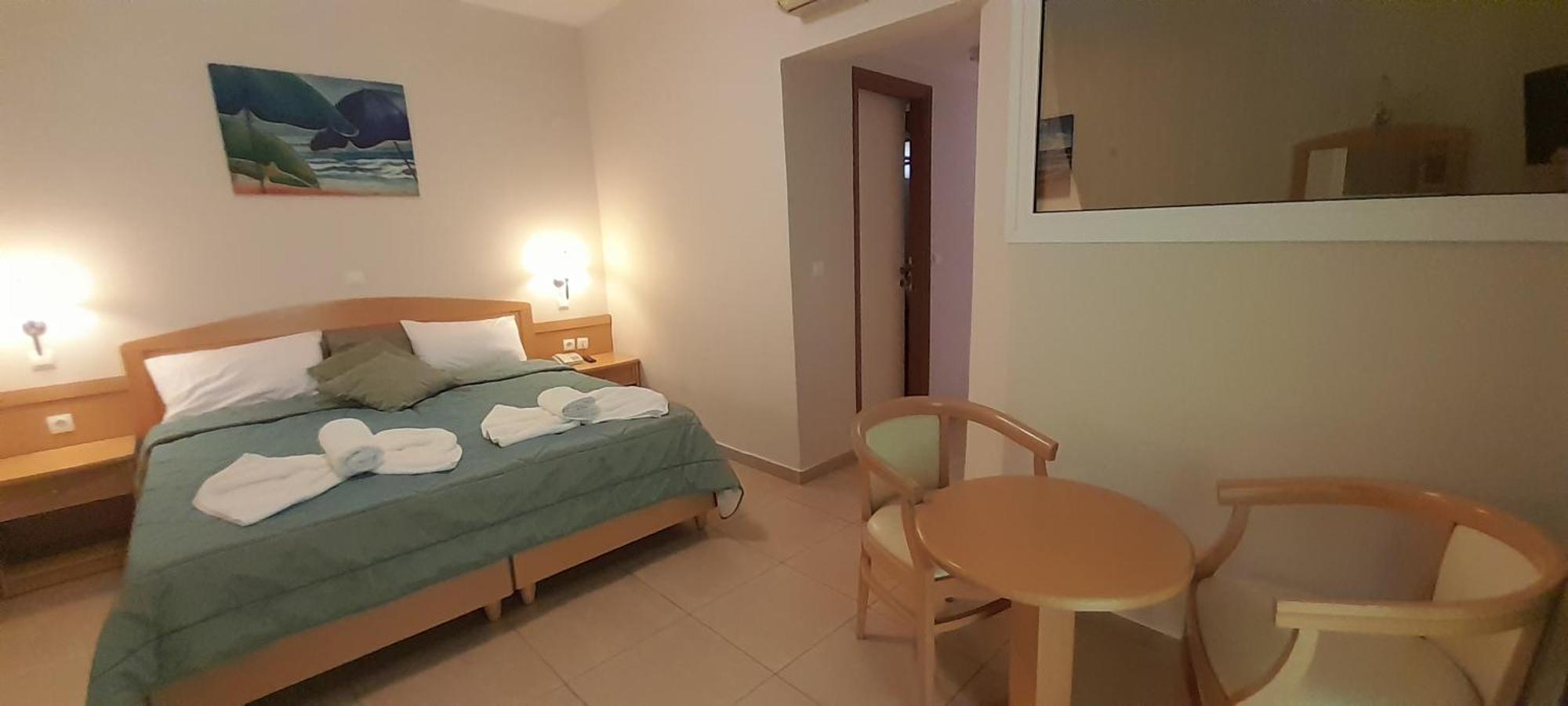 Hotel Serenity Toló Kültér fotó