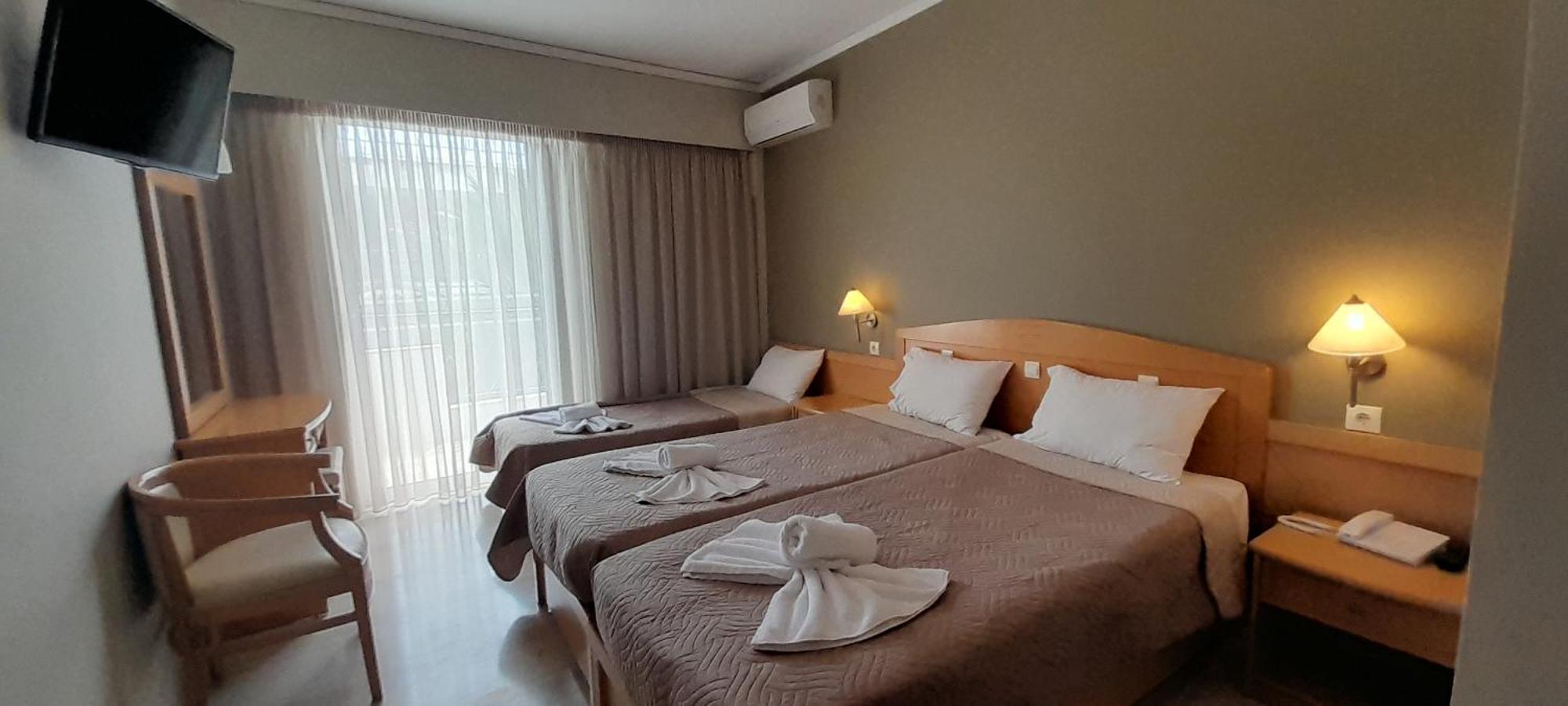 Hotel Serenity Toló Kültér fotó